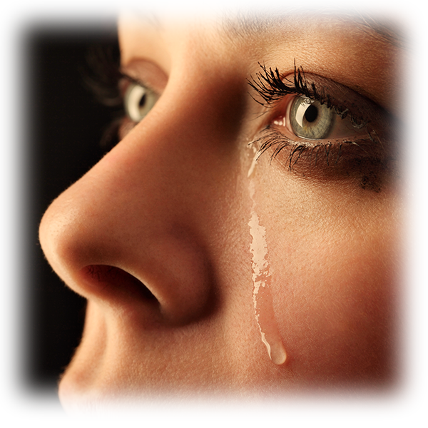 woman grieving with tears on her cheeks